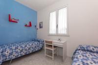 Posteľ alebo postele v izbe v ubytovaní Appartamento Carmen - Torre dell'Orso