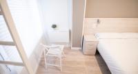 Postel nebo postele na pokoji v ubytování Happy Hostal Carrales