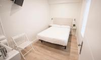 Postel nebo postele na pokoji v ubytování Happy Hostal Carrales