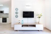 TV a/nebo společenská místnost v ubytování CORDOBA PREMIUM