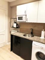 Kuchyň nebo kuchyňský kout v ubytování Apartamentos Las Vegas