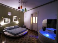 A bed or beds in a room at Suite Inn Centro Dimora Storica