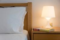 Posteľ alebo postele v izbe v ubytovaní Natsios Apartments