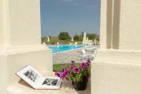 Bazén v ubytovaní Hotel Villa Calandrino alebo v jeho blízkosti