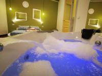 A bed or beds in a room at Suite Inn Centro Dimora Storica