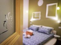 A bed or beds in a room at Suite Inn Centro Dimora Storica