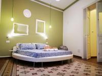 A bed or beds in a room at Suite Inn Centro Dimora Storica