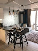Kuchyňa alebo kuchynka v ubytovaní Resort Apartamenty Klifowa Rewal 27