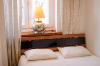 Posteľ alebo postele v izbe v ubytovaní Apartament RSL