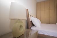 Posteľ alebo postele v izbe v ubytovaní Keramoti Luxury Apartments