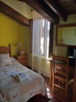Postel nebo postele na pokoji v ubytování Posada Rural Entrecomillas