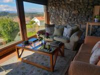 Posezení v ubytování Posada Rural Entrecomillas