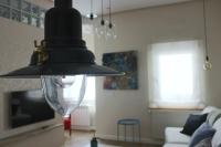 Televízia a/alebo spoločenská miestnosť v ubytovaní Apartamento Mercado-Centro