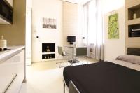 Televízia a/alebo spoločenská miestnosť v ubytovaní Design central studio - Porta Romana