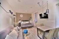Posteľ alebo postele v izbe v ubytovaní Apartamenty Sjesta Centrum