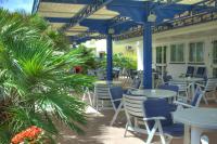 Reštaurácia alebo iné gastronomické zariadenie v ubytovaní Hotel Blues
