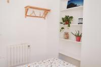 Posteľ alebo postele v izbe v ubytovaní Amparito Apartment - Casc Antic