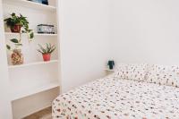 Posteľ alebo postele v izbe v ubytovaní Amparito Apartment - Casc Antic