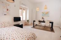 Posteľ alebo postele v izbe v ubytovaní Amparito Apartment - Casc Antic