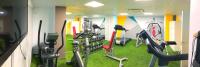 a gym with several treadmills and exercise bikes at Hotel Ritual Torremolinos- Adults Only in Torremolinos