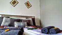 Posteľ alebo postele v izbe v ubytovaní Turul Apartment Budapest