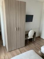 Posteľ alebo postele v izbe v ubytovaní Relais fiera milano