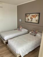 Posteľ alebo postele v izbe v ubytovaní Relais fiera milano
