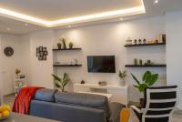 Televízia a/alebo spoločenská miestnosť v ubytovaní Apartamentos Cantarería, Azahar