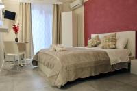 Posteľ alebo postele v izbe v ubytovaní Triscele Glamour Rooms