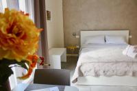 Posteľ alebo postele v izbe v ubytovaní Triscele Glamour Rooms
