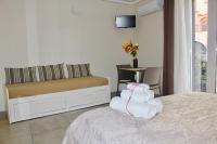 Posteľ alebo postele v izbe v ubytovaní Triscele Glamour Rooms