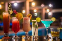 een groep verschillende cocktails zittend op een tafel bij Okay 1 Villa in Siem Reap