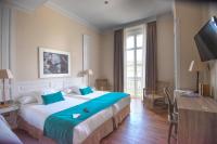 Postel nebo postele na pokoji v ubytování Hotel Villa Rosario, Palacete