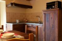Kuchyňa alebo kuchynka v ubytovaní Le Petit Coeur Residence De Montagne