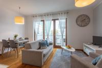 Televízia a/alebo spoločenská miestnosť v ubytovaní Ambria Apartments Platan Complex