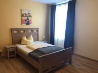 Postel nebo postele na pokoji v ubytování Hotel Rabenstein