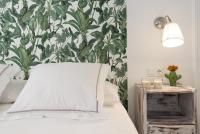 A bed or beds in a room at Berlanga, apartamento en el centro