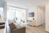 A television and/or entertainment centre at Berlanga, apartamento en el centro