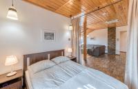 Posteľ alebo postele v izbe v ubytovaní Apartamenty Zdrojowa