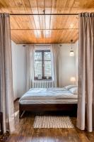 Posteľ alebo postele v izbe v ubytovaní Apartamenty Zdrojowa
