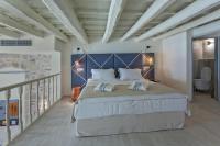 Posteľ alebo postele v izbe v ubytovaní Thalassa Boutique Hotel