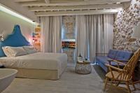 Posteľ alebo postele v izbe v ubytovaní Thalassa Boutique Hotel