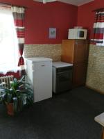 Kuchyň nebo kuchyňský kout v ubytování Nature Apartments