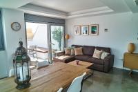Posedenie v ubytovaní Fabulous Penthouse Downtown Tarifa, Maestro Apartments