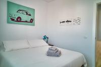 Posteľ alebo postele v izbe v ubytovaní Fabulous Penthouse Downtown Tarifa, Maestro Apartments