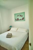 Posteľ alebo postele v izbe v ubytovaní Fabulous Penthouse Downtown Tarifa, Maestro Apartments