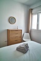 Posteľ alebo postele v izbe v ubytovaní Fabulous Penthouse Downtown Tarifa, Maestro Apartments