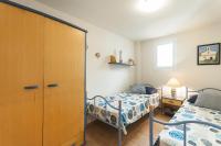 Postel nebo postele na pokoji v ubytování Lets Holidays Codolar 2 apartment