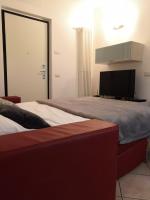 Posteľ alebo postele v izbe v ubytovaní Apartment Alessandra