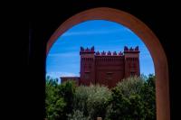 a view of a building through an arch at Kasbah Ait Kassi in Boumalne